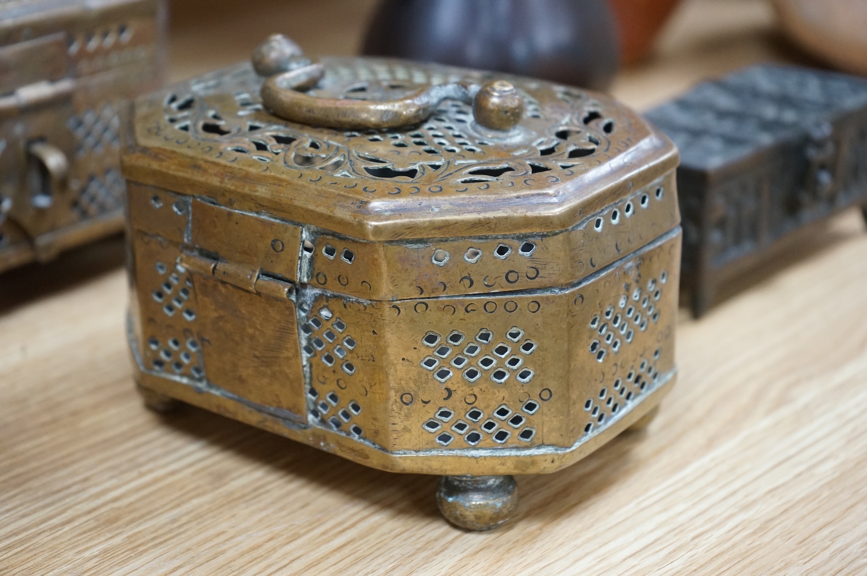 A Japanese archaistic bronze vase, seal mark to base, together with two Indian brass Paan boxes and a Medieval revival bronze casket, tallest 26cm